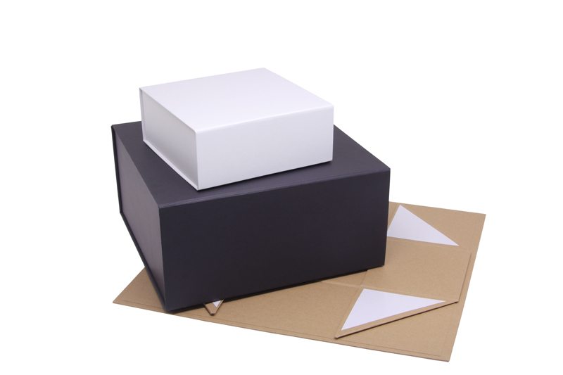 Magnetic boxes coated with kraft paper
